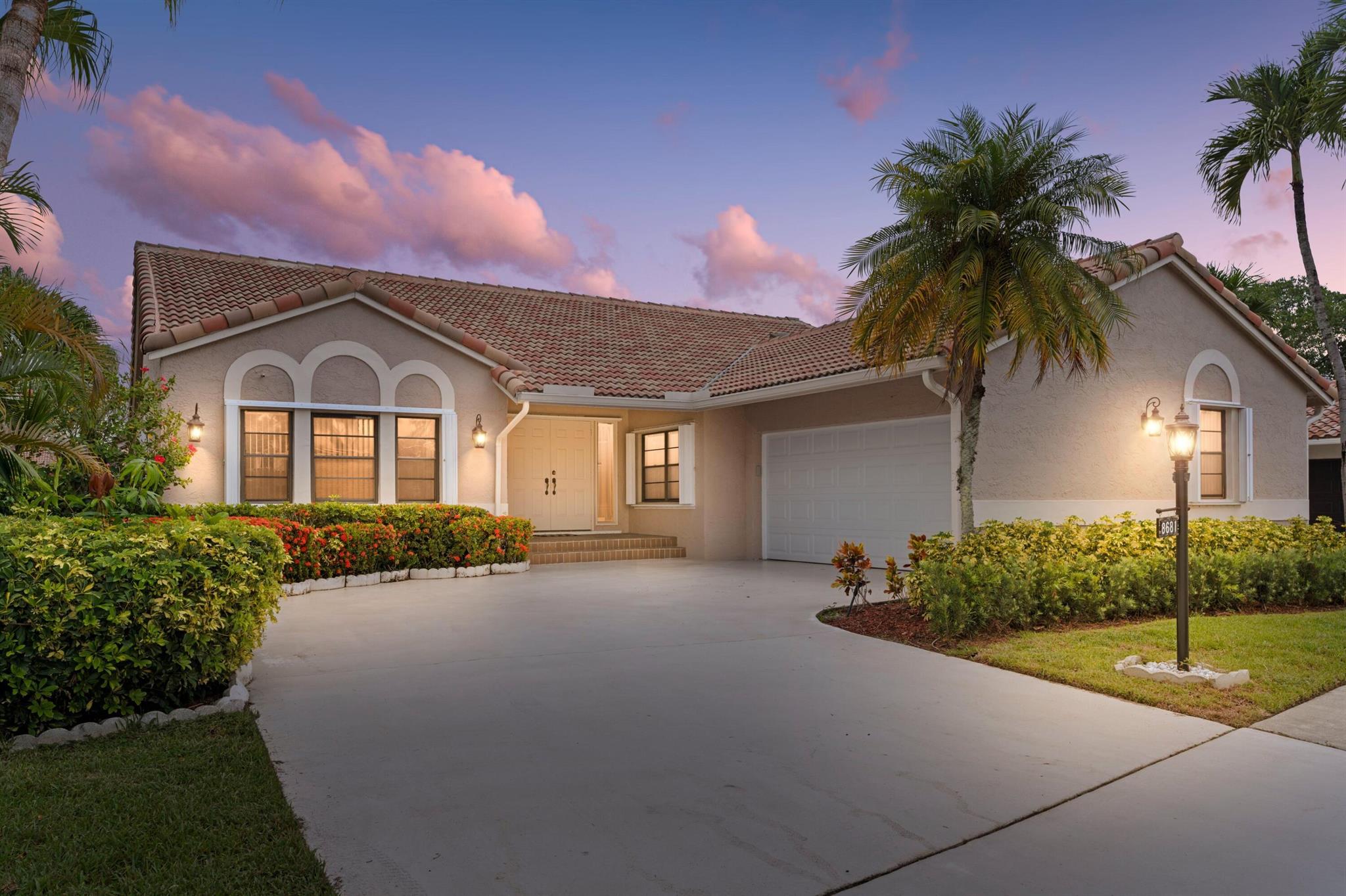 STUNNINGLY BEAUTIFUL WATERFRONT ESTATE | DESIRABLE GATED COMMUNITY OF WEDGEWOOD ESTATES | PRIME BOCA RATON LOCATION | BREATHTAKING LAKE VIEWS | WALK TO POOL | Immaculate Manicured Landscaping | Double Door Entrance | Bright Open Floor Plan | Skylights | LED Recessed Lighting | Dramatic Vaulted Ceilings | Wet Bar | Eat-In Kitchen w/ Breakfast Bar | Granite Countertops | S/S Appliances | Wood Cabinets | Huge Primary Bedroom | 3 Closets | Updated En-suite, Dual Sink Vanity, Jacuzzi Tub & Glass Shower | Walk-In Closet | Bonus In-Home Office | Screened Covered Patio | 2 Car GA w/ Storage | Offering Resort-Like Amenities, Clubhouse, Pool, Tennis Courts & More! Minutes to Beach, FAU, Mizner Park & Delray Beach Atlantic Ave | WH 2017 | AC 2017 | Roof 2010 | PRESENT ALL OFFERS!