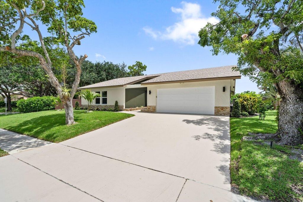 Photo of 2399 NW 30th Street, Boca Raton, FL 33431 (MLS # R11127307)