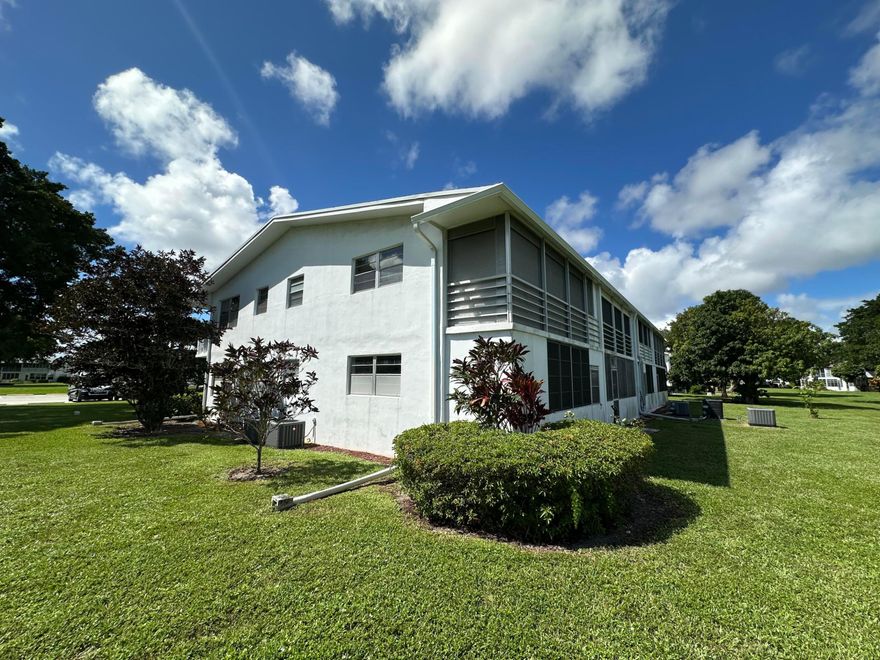 In the heart of DEERFIELD BEACH, this lovely GROUND FLR. CORNER 2 bedrm, 1.5 bath condo is PRICED TO SELL! Unit is very bright & located in the center of the community featuring lg tile flrs in liv areas & carpet in bedrms, updated shower stall w/glass doors in primary bath, freshly painted & A/C 2022. The enclosed patio has a storage closet & overlooks a quiet garden view. Building has a NEW ROOF! This active adult community is gated, 24/7 security, free bus service, lavish clubhouse w/ a 1500 seat theater, state of the art gym, tennis, indoor/outdoor pools, pickleball, putting green, classes of every type, clubs, free movies, shuffleboard, billiards, library & more! Close to shopping, great restaurants, hwys & beach! Easy to show! Don't miss this great opportunity! ASSOC. CLAIMS 55+