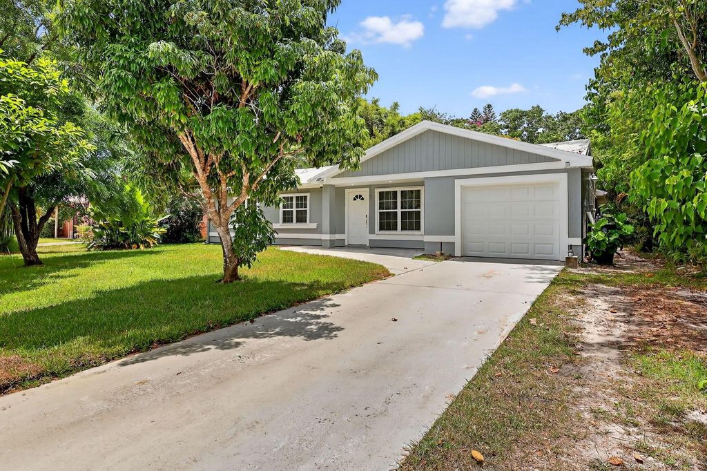Photo of 2019 SE New York Street, Port Saint Lucie, FL 34952 (MLS # R11112421)