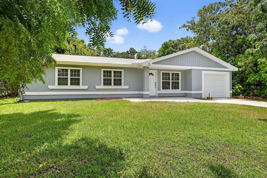 Photo of 2019 SE New York Street, Port Saint Lucie, FL 34952 (MLS # R11112421)