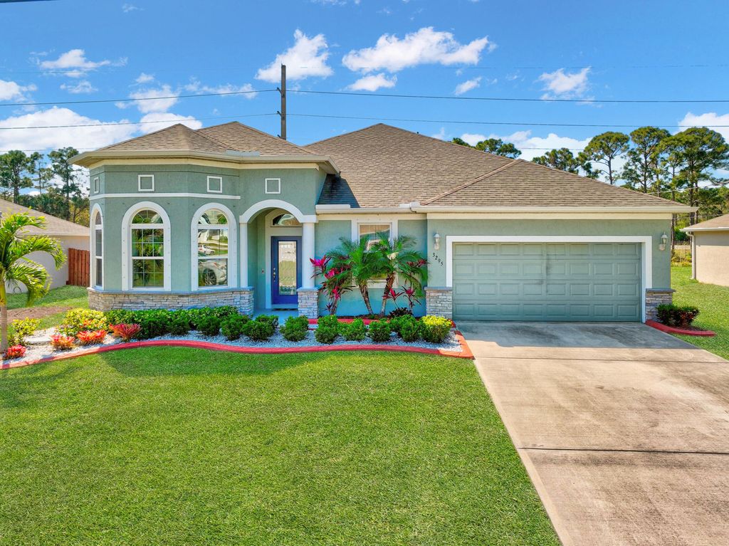 Photo of 3295 SE Quay St, Port Saint Lucie, FL 34984 (MLS # R10870607)