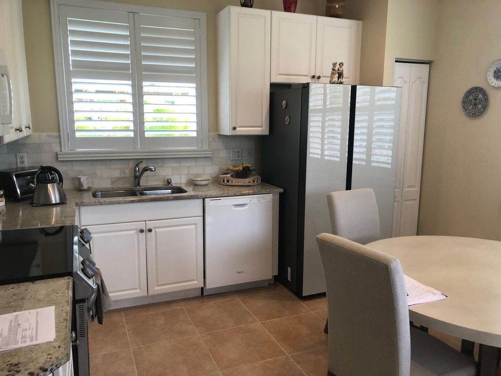 Photo of 10083 SW Chadwick Drive, Port Saint Lucie, FL 34987 (MLS # R11034660)