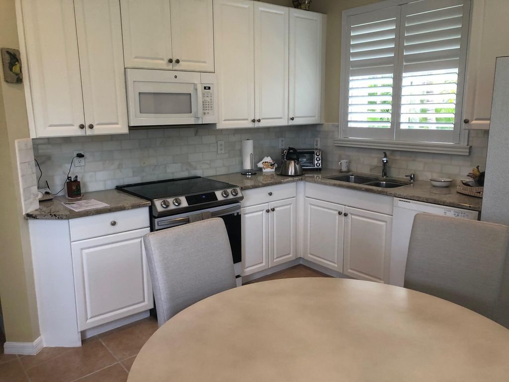 Photo of 10083 SW Chadwick Drive, Port Saint Lucie, FL 34987 (MLS # R11034660)