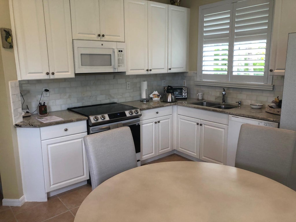 Photo of 10083 SW Chadwick Drive, Port Saint Lucie, FL 34987 (MLS # R11034660)