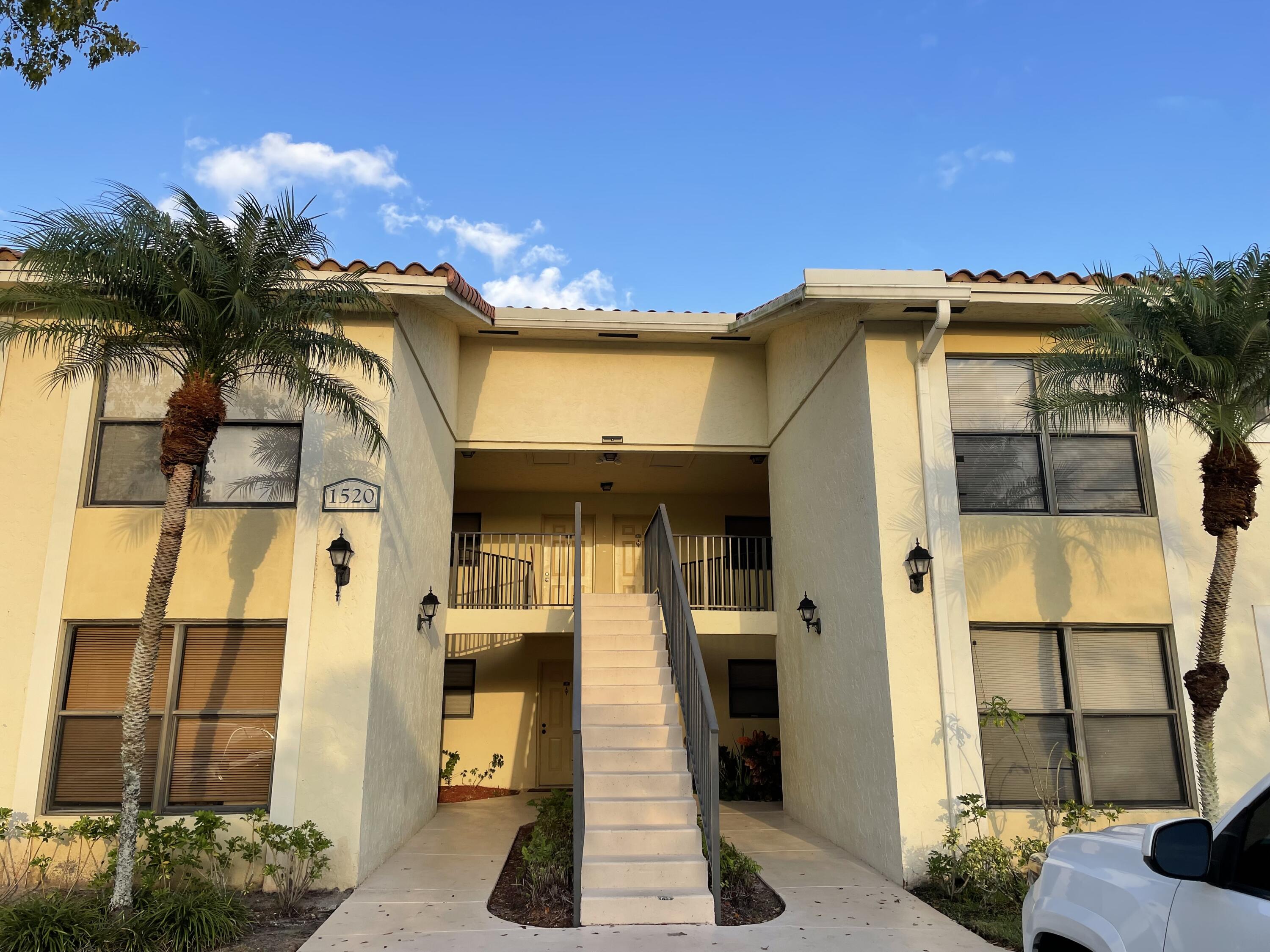 Investor's dream. VACANT, can be rented right away. Second floor, lake view unit selling AS IS. Fresh light gray walls, new laminate floors in both bedrooms, new stove and refrigerator are waiting for the new tenant to move in. Palm Beach Grande Condo is a great community located in West Palm Beach near major roads, shops, schools and more. Community amenities includes POOL, HOT TUB, TENNIS CORT, KIDS PLAY AREA. High rate of return. Won't last long!