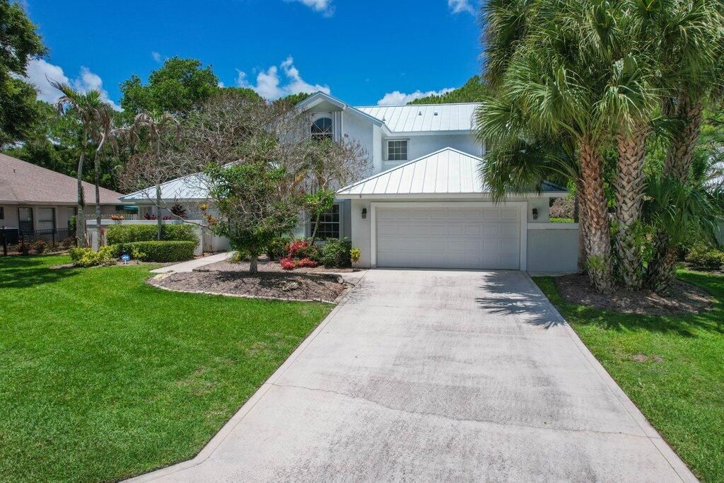 Photo of 3730 SW Woodbriar Lane, Palm City, FL 34990 (MLS # B26037709)