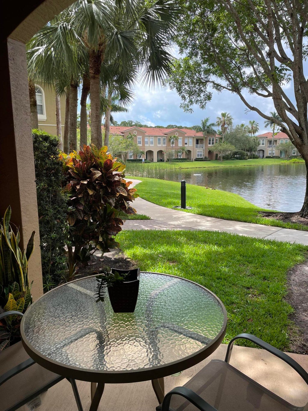 Photo of 4870 Bonsai Circle #100, Palm Beach Gardens, FL 33418 (MLS # B26057867)