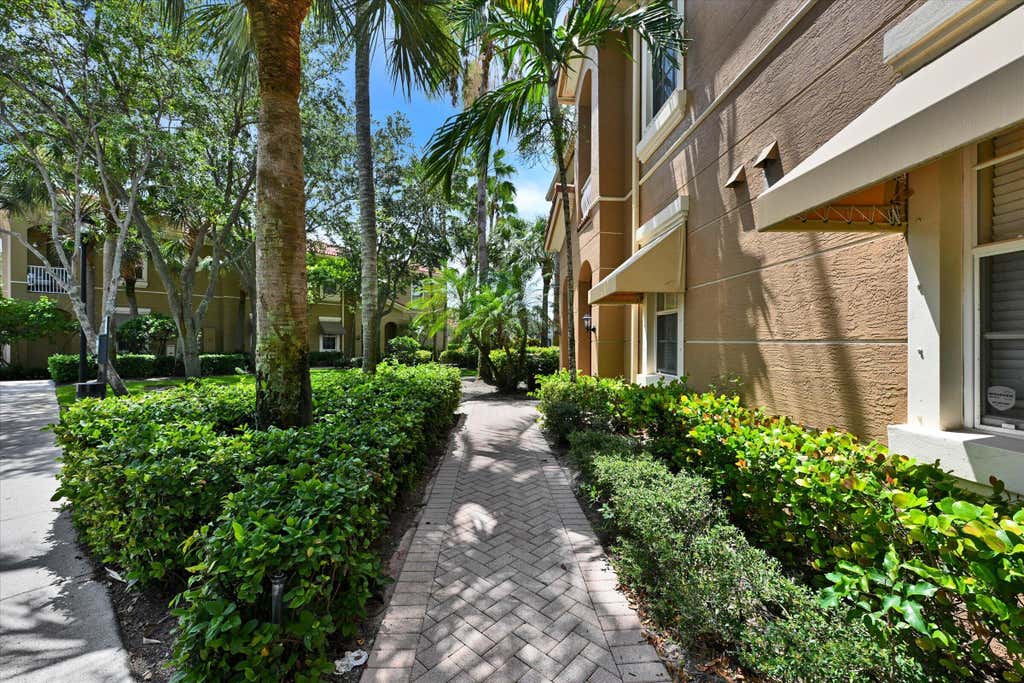 Photo of 4870 Bonsai Circle #100, Palm Beach Gardens, FL 33418 (MLS # B26057867)