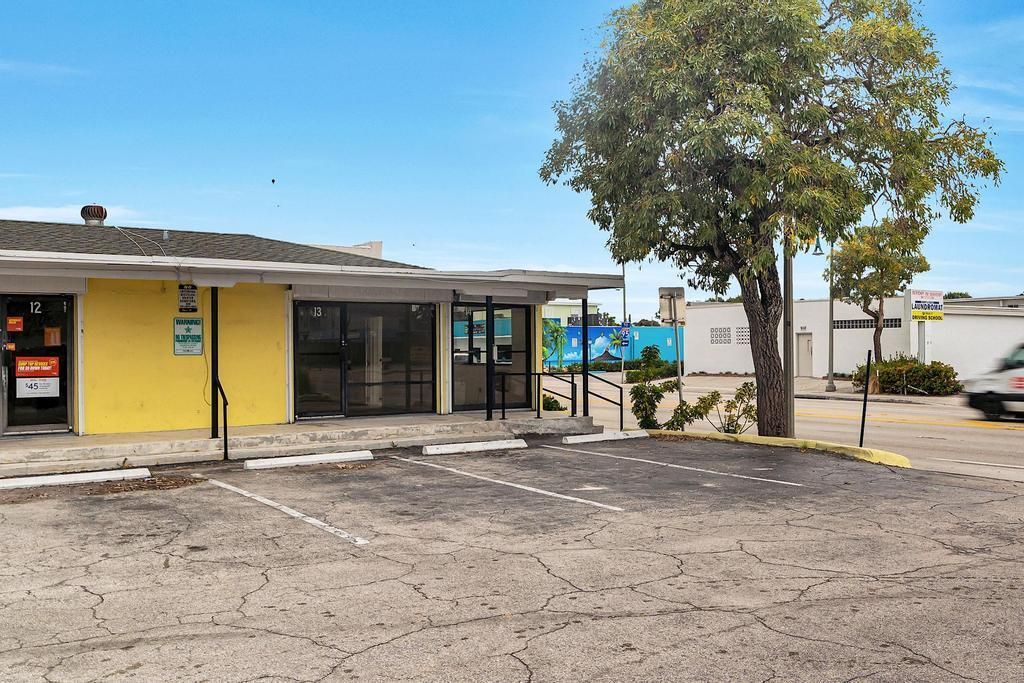 Photo of 901 N Dixie Highway #13-14, Lake Worth Beach, FL (MLS # R11115539)