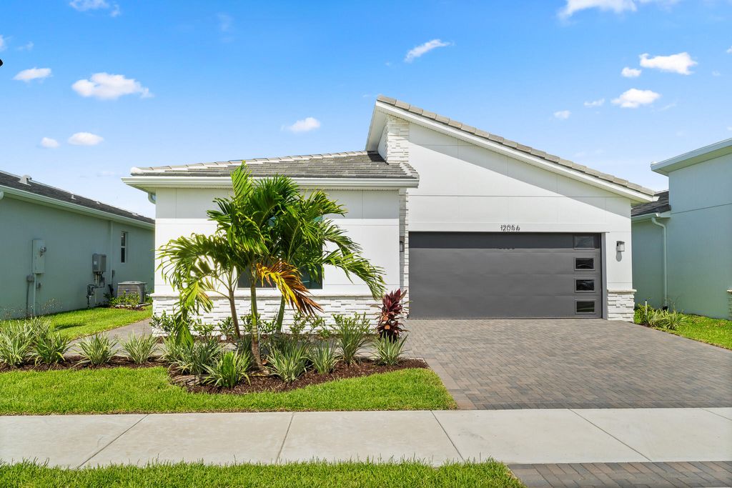 Photo of 12056 SW Pantone Street, Port Saint Lucie, FL 34987 (MLS # B26009347)