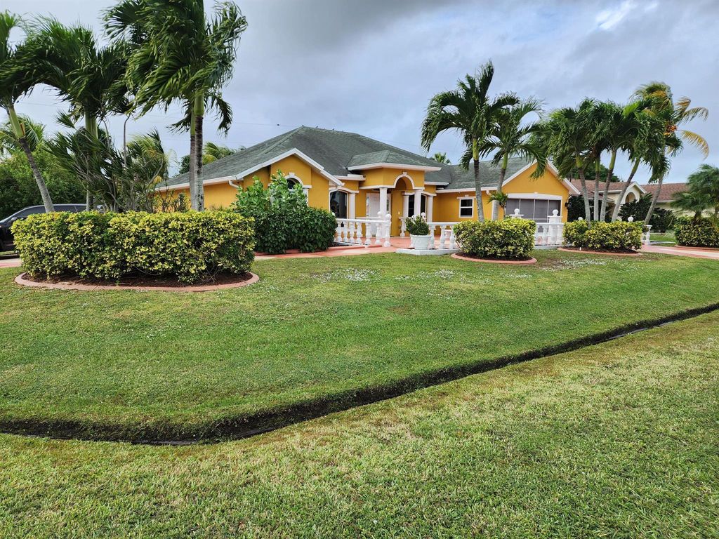 Photo of 2853 SE Melaleuca Boulevard, Port Saint Lucie, FL 34952 (MLS # R10937455)