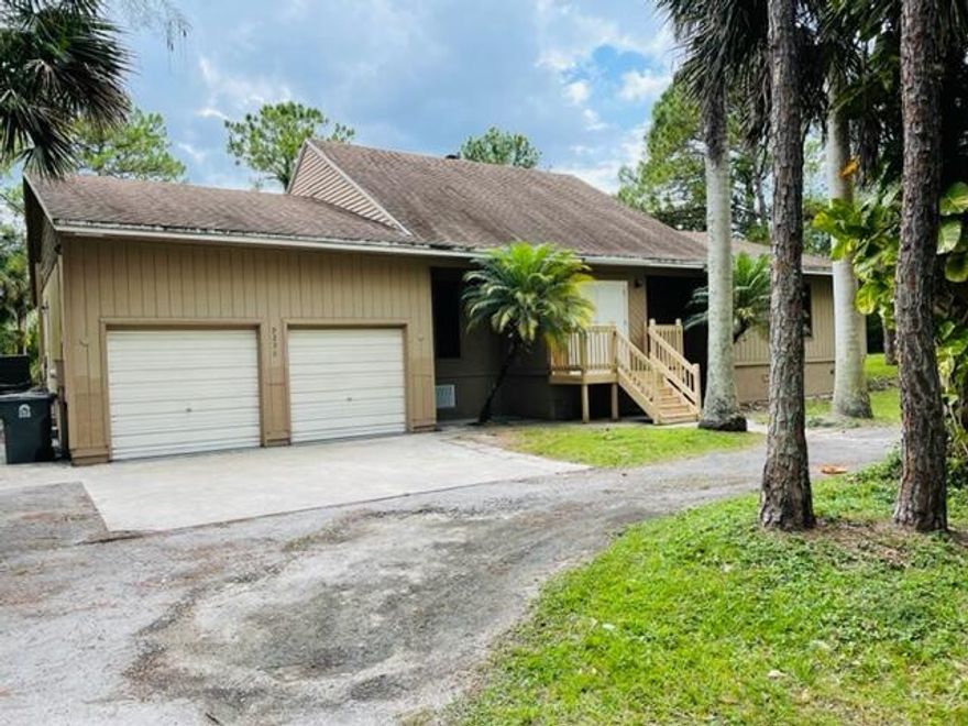 CASH ONLY NEEDS WORK. Nice Home in Jupiter Farms. Home is located a paved road in prime location in Jupiter Farms. Home sits on 1.25 acres and is fully fenced. Very spacious and open layout with high vaulted ceilings. Additional private In-Law suite with separate entrance at the rear of home. Also a separate Den/office at the rear of the 2 car garage with separate entrance. Very unique home with tons of potential. CASH ONLY.