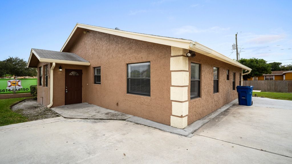 Photo of 1233 W 32nd Street, Riviera Beach, FL 33404 (MLS # R11145484)