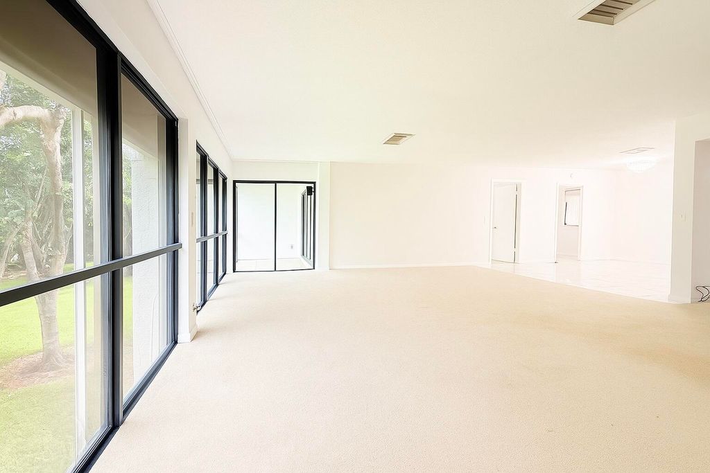 Photo of 1739 Embassy Drive #202, West Palm Beach, FL 33401 (MLS # R11166461)