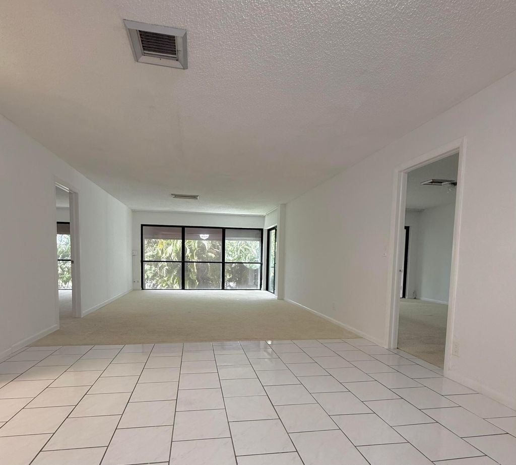 Photo of 1739 Embassy Drive #202, West Palm Beach, FL 33401 (MLS # R11166461)