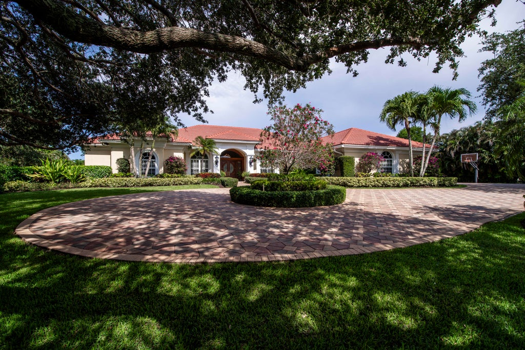 Photo of 7656 Steeplechase Drive, Palm Beach Gardens, FL 33418 (MLS # R11096478)
