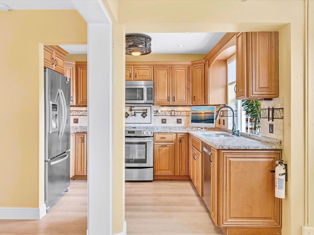 Photo of 22 Colonial Club Drive #302, Boynton Beach, FL 33435 (MLS # R11068993)