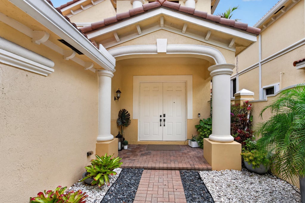 Photo of 1687 Passion Vine Circle #1687, Weston, FL 33326 (MLS # B26037987)