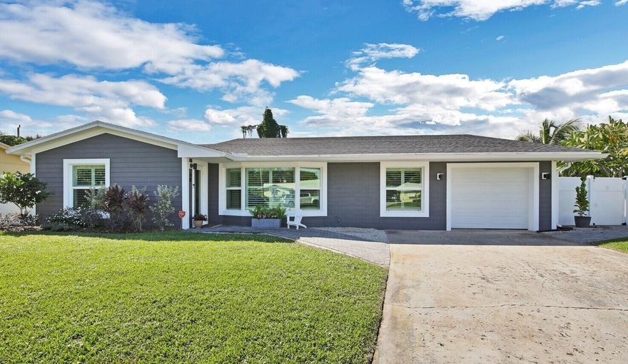 Fully furnished, turnkey house is available for monthly or annual rental. This modern, renovated 4-bedroom, 3-bathroom home is located on a quiet cul-de-sac in the Village of Tequesta. The kitchen features quartz countertops, stainless steel appliances, & a spacious island. The primary suite includes a king bed, a walk-in closet, and an en-suite bathroom with an oversize shower. The second suite features a king bed, a dedicated workstation, & private ensuite with a tub. Two additional bedrooms share a third bathroom; one features a king bed, and the other has a queen Murphy bed.Enjoy a large workspace off the kitchen, laundry room, and 1-car garage. The fully fenced backyard features a 6-person dining set with an umbrella, BBQ, and fire pit.