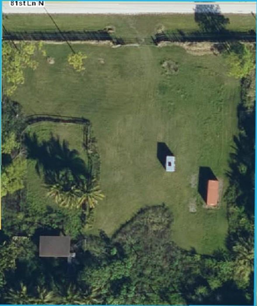 The property is vacant, cleared, filled, fenced, has electric and 2 wells. Small poll barn on the property.