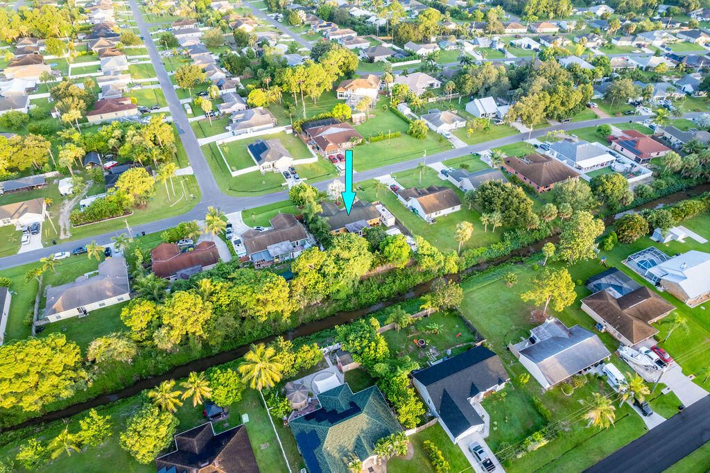 Photo of 2989 SW Ventura Street, Port Saint Lucie, FL 34953 (MLS # R10950133)