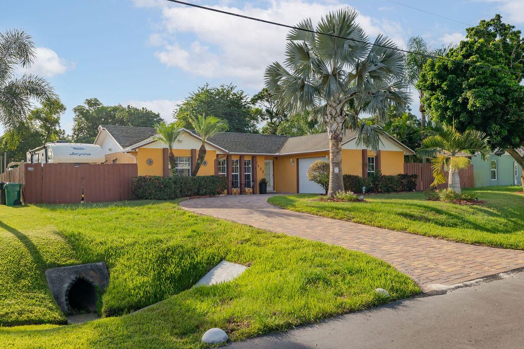 Photo of 2989 SW Ventura Street, Port Saint Lucie, FL 34953 (MLS # R10950133)