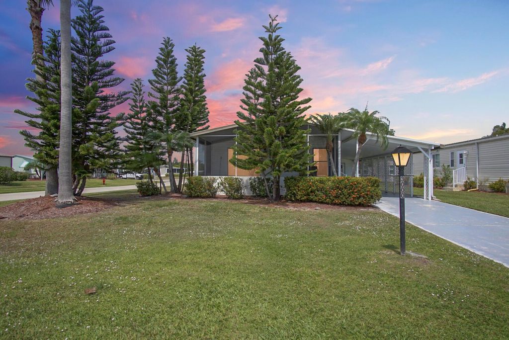 Photo of 3000 Satinleaf Lane, Port Saint Lucie, FL 34952 (MLS # R10974143)