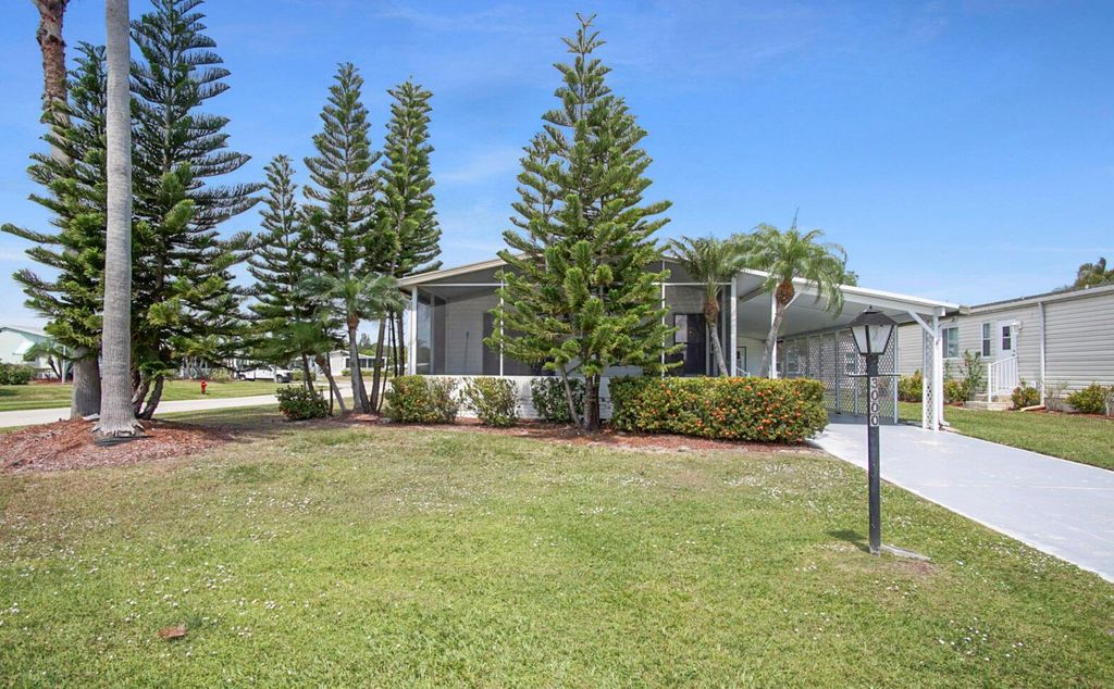 Photo of 3000 Satinleaf Lane, Port Saint Lucie, FL 34952 (MLS # R10974143)