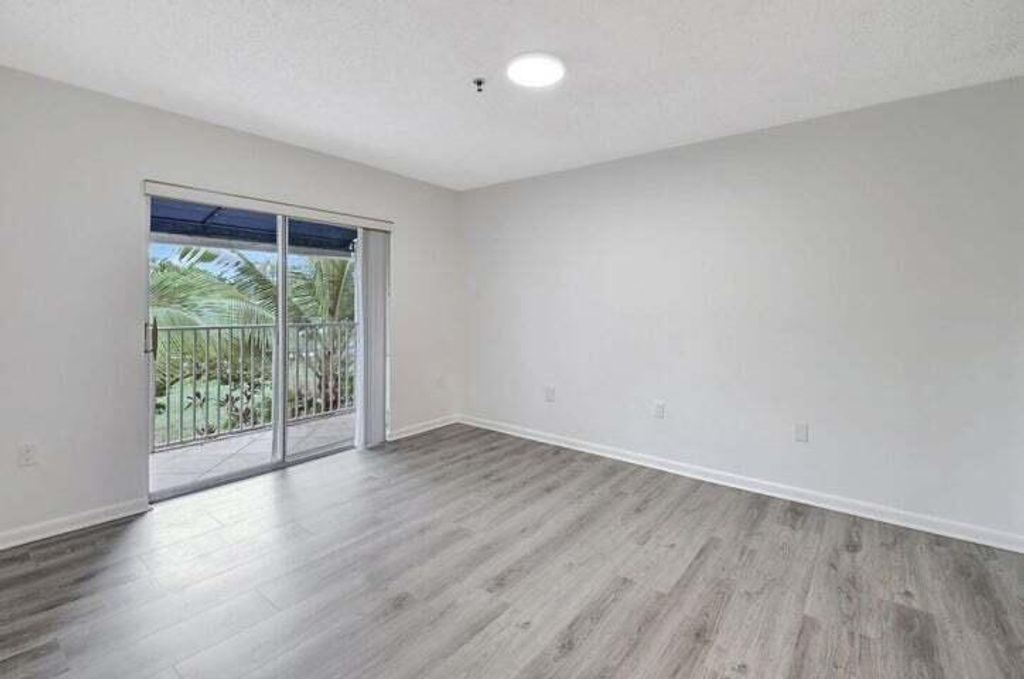 Photo of 3111 Clint Moore Road #202, Boca Raton, FL 33496 (MLS # R11119162)