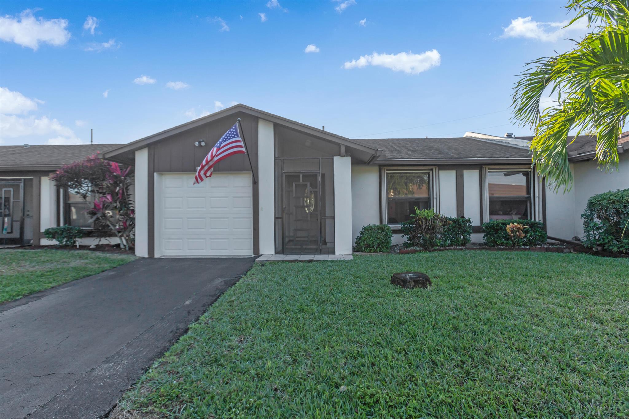 Welcome to your dream home! FHA-VA approved Community! This beautifully remodeled 3 bed, 2 bath lake view villa in the heart of Delray Beach is a true gem. Impeccably maintained, with a large living room and enclosed patio, offering the perfect retreat to relax and immerse yourself in the captivating lake views!It boasts a 2019 AC, granite kitchen countertops, and stainless steel appliances. No worries about storms with shutters on all windows and a new garage door. Enjoy the convenience of a full-size washer/dryer and plenty of extra storage in the garage.Situated in the gated 55+ community of Las Verdes, this property offers a vibrant lifestyle with 3 pools, tennis, bocce & pickleball courts, jacuzzis, shuffleboard, and scenic walking/jogging areas around a serene community lake.