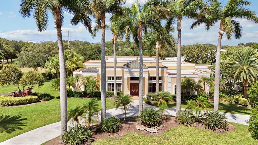 Rarely does an opportunity like this come to market in Admirals Cove. Build your dream estate or unlock the full potential of one of Admirals Cove's most compelling properties. Set on a rare .65-acre golf course lot on prestigious Spyglass Lane, this single-story CBS home offers an extraordinary opportunity to enjoy now, renovate to perfection, or create a spectacular new custom residence with the potential for Intracoastal views.  With 4,393 square feet under air and more than 6,100 total square feet, the home features soaring ceilings, expansive open living spaces, a large kitchen, and a generous primary suite. Outside, a screened patio, private pool, and lush tropical landscaping create a serene setting for relaxed living and entertaining. The garage accommodates two cars plus one golf  cart, completing the ideal country club lifestyle package.  Surrounded by newly built luxury estates and located just moments from The Club at Admirals Cove's premier amenities and activities, this is a rare chance to secure a prime property in one of Jupiter's most coveted communities. Golf membership available, please see documents.