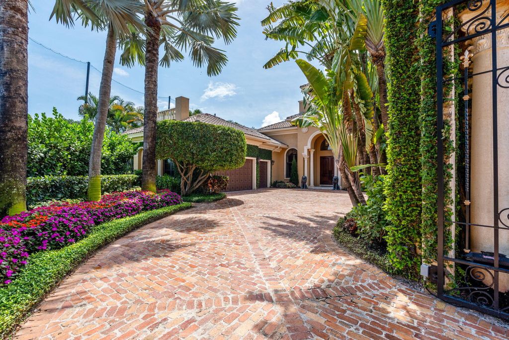 Photo of 301 Mizner Lake Estates Drive, Boca Raton, FL 33432 (MLS # B26014212)