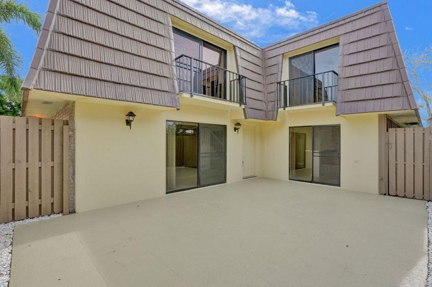 Discover luxury living in this meticulously renovated townhouse nestled in the heart of Palm Beach Gardens. The allure begins with a brand-new kitchen, boasting modern appliances and exquisite quartz countertops that set the stage for culinary delight. Step onto plush, new carpets that guide you through each carefully crafted space, while the freshly painted walls create an atmosphere of elegance, while you sit in front of the fireplace. 

Ascend to the second floor, where the well-appointed bedrooms provide comfort and tranquility. Outside, a new fence encloses a private oasis, perfect for relaxation and entertaining. With the added benefit of low HOA fees & a new roof. Don't miss the chance to make this gem your dream home.