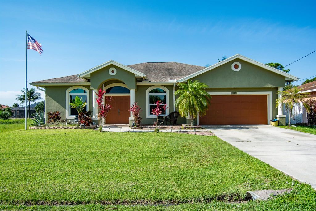 Photo of 1080 SW Romaine Lane, Port St Lucie, FL 34953 (MLS # R10896296)