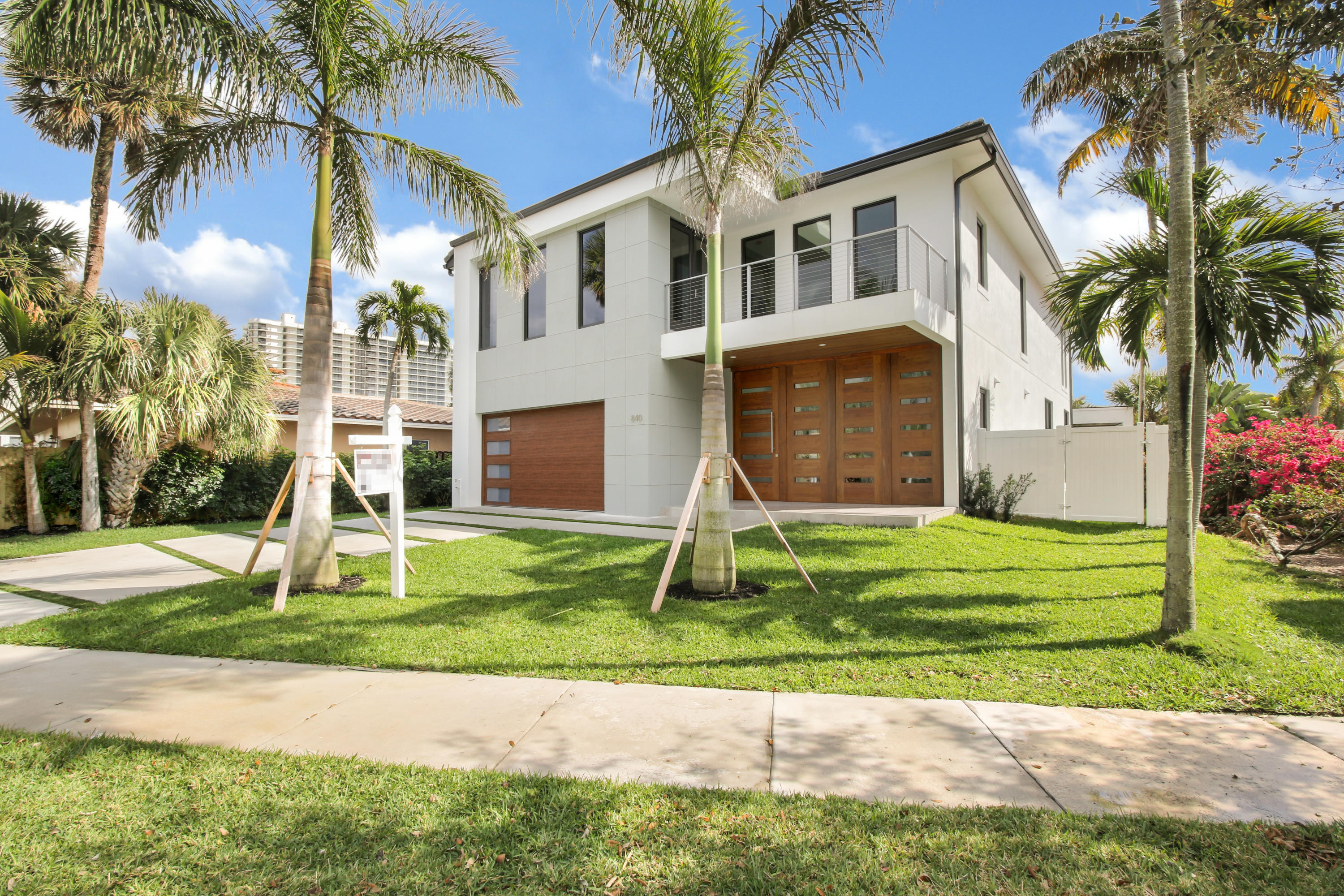 Walk one block to the beach or East Palmetto Park Road shops and restaurants from this Por La Mar Brand New Estate Home.