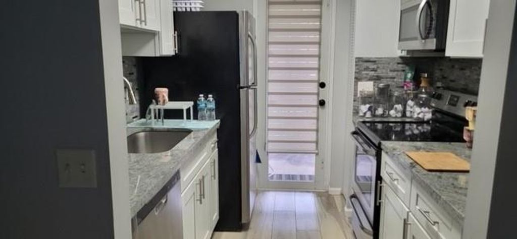 Photo of 4784 S Central 14 Boulevard #14, Jupiter, FL 33458 (MLS # F10431311)