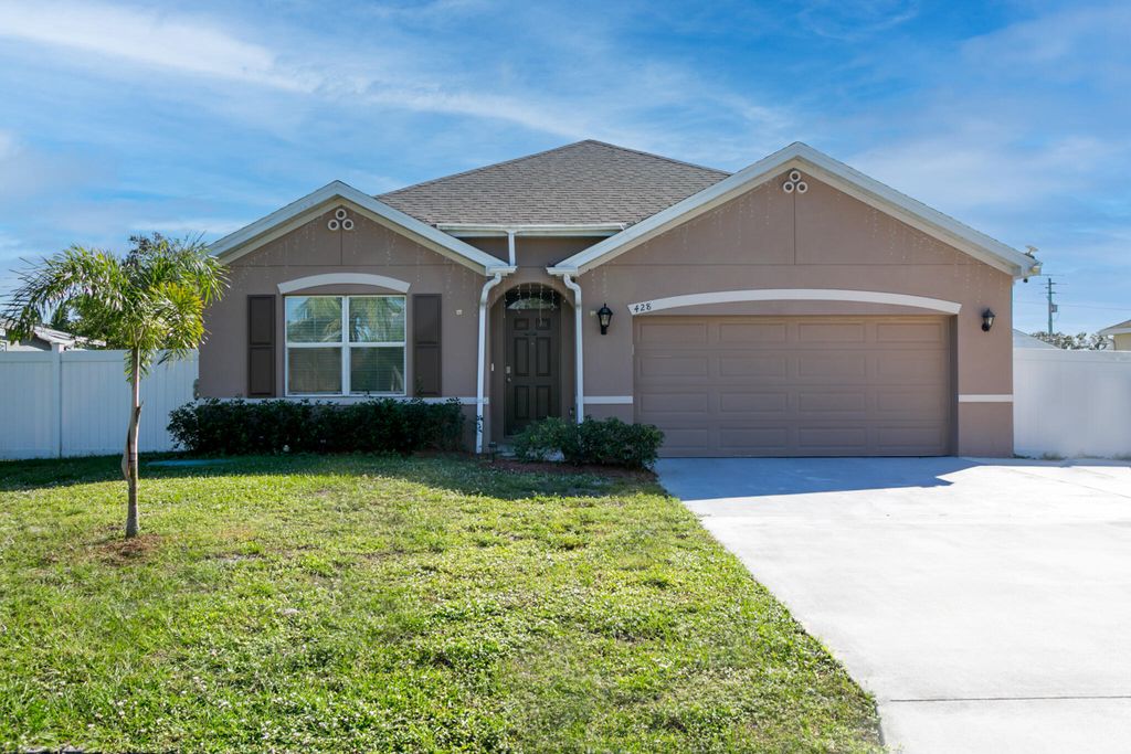 Photo of 428 SE Fairchild Avenue, Port Saint Lucie, FL 34984 (MLS # R11137947)