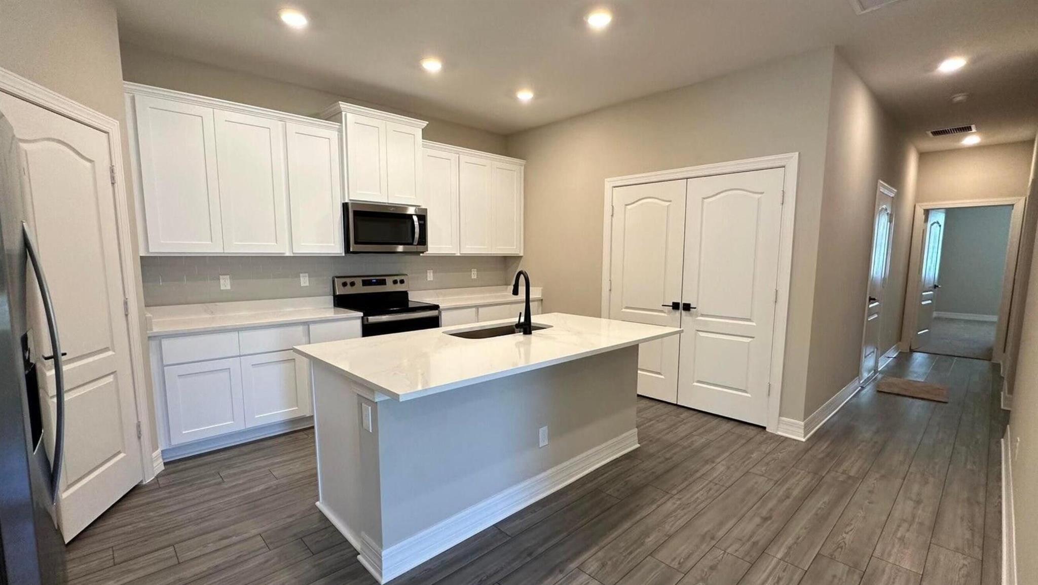 Nestled in a quiet neighborhood, this charming 4-bedroom, 2-bathroom townhouse is a pristine gem built in 2023. This home offers a fresh start for its lucky residents. Boasts a modern design, spacious layout, and all-new fixtures and appliances. The community offers a beautiful pool and picnic area. Don't miss the opportunity to make this beautiful home your own!