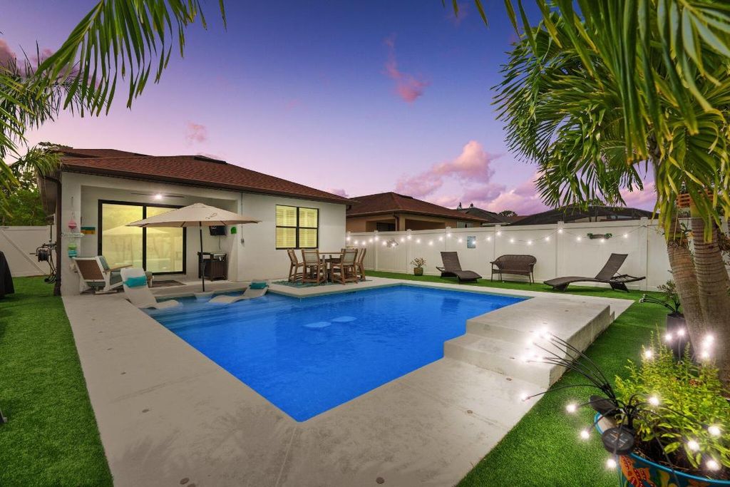 Photo of 260 SE Via Visconti, Port Saint Lucie, FL 34952 (MLS # R11096993)