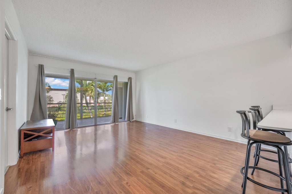 Photo of 3075 Gardens E Drive #24, Palm Beach Gardens, FL 33410 (MLS # B26030881)