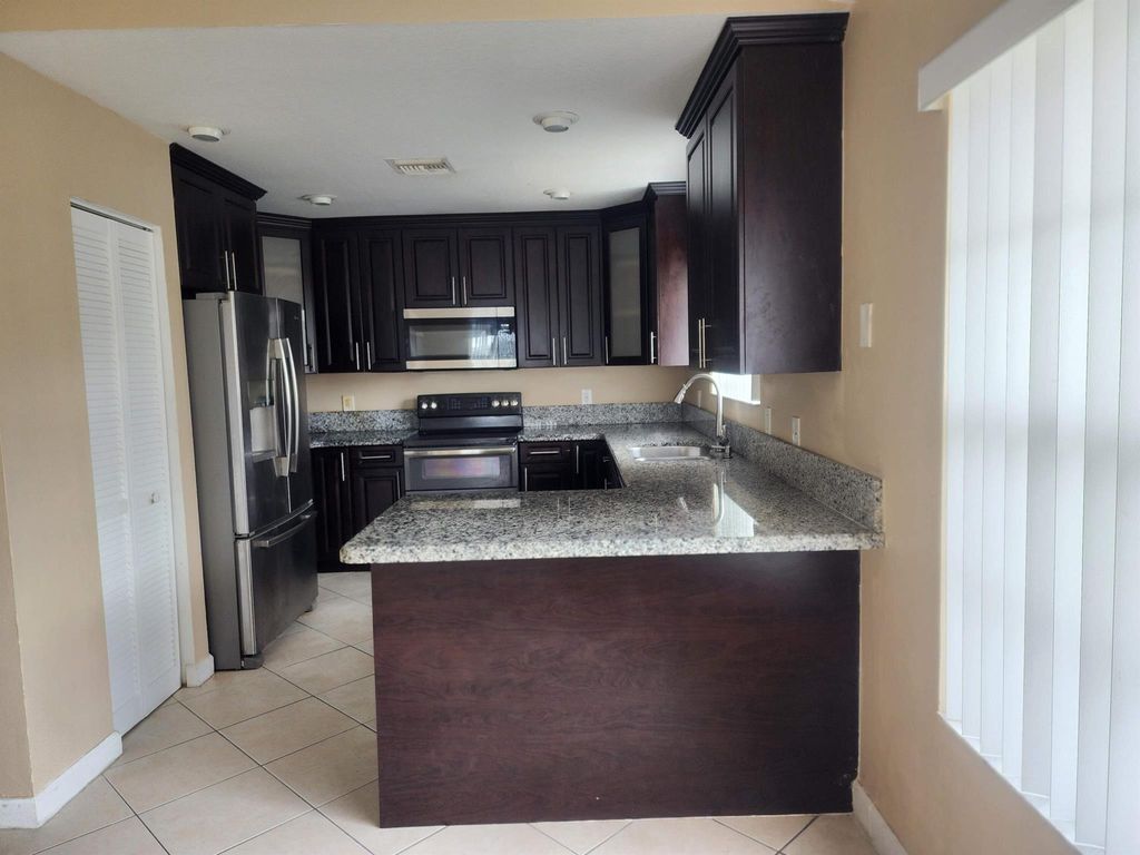 Photo of 1251 Rowayton Circle, Wellington, FL 33414 (MLS # R11035905)