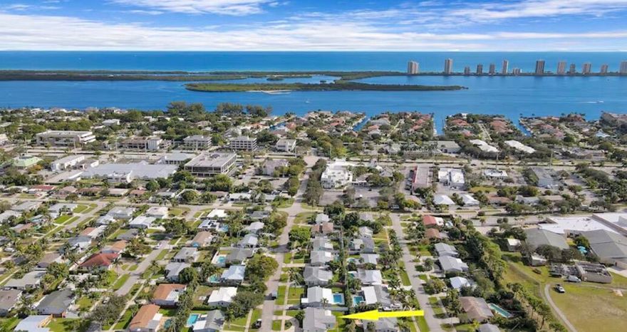 Welcome to this beautifully completely remodeled residence in the highly desirable Village of NPB. This 4 bed 2 bath home offers spacious living with top of the line finishes. Features include hardwood floors, updated kitchen with a large island, a vaulted living room ceiling and a generous dining area. Ideal for families and those enjoying the seasonal South FL lifestyle, this home is designed for effortless living and entertaining. Step into a serene tropical backyard, beautiful framed by colusa hedges offering privacy and a lush setting. Features also include  a covered lanai with a fire pit area and room for a boat or plenty of water toys. Enjoy easy access to Anchorage Park, NPB CC and outstanding dining. No detail was overlooked in this home. Renovated from the ground up, impact windows, doors, gas stove, Tesla charger and so much more this home is ready to go! Schedule your private viewing today. See documents for a list of all upgrades.