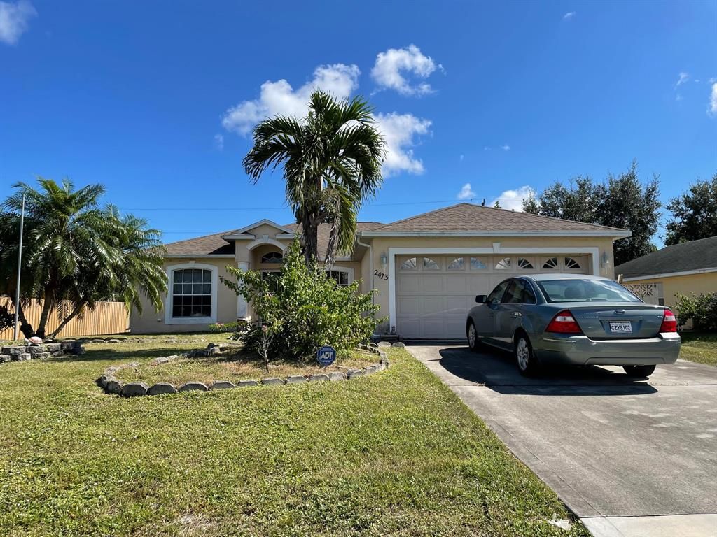 Photo of 2473 SW Monterrey Lane, Port Saint Lucie, FL 34953 (MLS # R10750272)