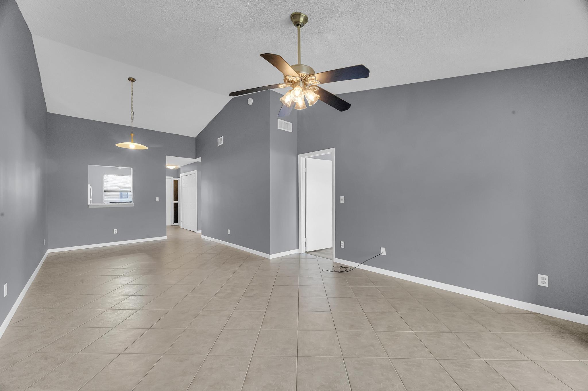 2BR/2BA Condo with Water Views - Stuart, FL. PRIME LOCATION. Beautifully updated 2 bedroom, 2 bath condo featuring cathedral-style ceilings, updated kitchen, fresh paint, and tile/vinyl flooring throughout. Washer and dryer inside the unit. Dedicated parking spot included. Enjoy amazing water views from the screened patio. WATER and SEWER and BASIC CABLE included in rent. Community amenities include pool, clubhouse, and tennis. Prime location near beaches, downtown Stuart, shopping, and easy access to major roads. Application required. Available now.