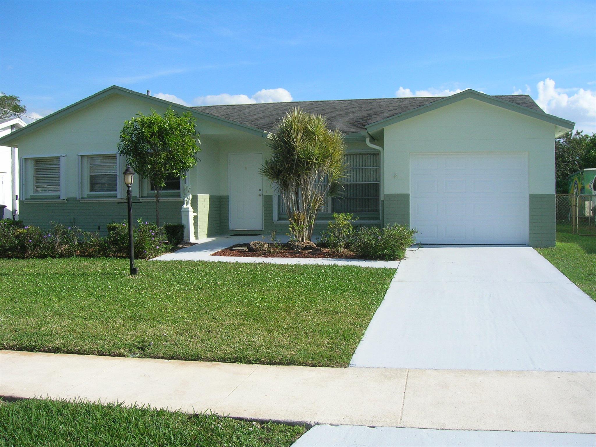 Move in today to this excellent house. Completed painted in and out, ceramic tiles floors, kitchen granite counter tops. The The floor plan shows a living/dining rooms combined areas, the kitchen have an eat in kitchen extra space with a closet, from the hallway you will access to the 3 bedrooms, those have ample closets and ceiling fans, the 2 baths are really outstanding comfortable, at the 1 car garagethere is a laundry area with washer, dryer, water heater, A/C unit, the screened terrace is excellent to enjoy with your family and friends. The back patio is facing a canal view that give you an outdoor extra space. Come and enjoy the family oriented neighborhood, close to great schools, recreational parks, main national stores, restaurants and more.