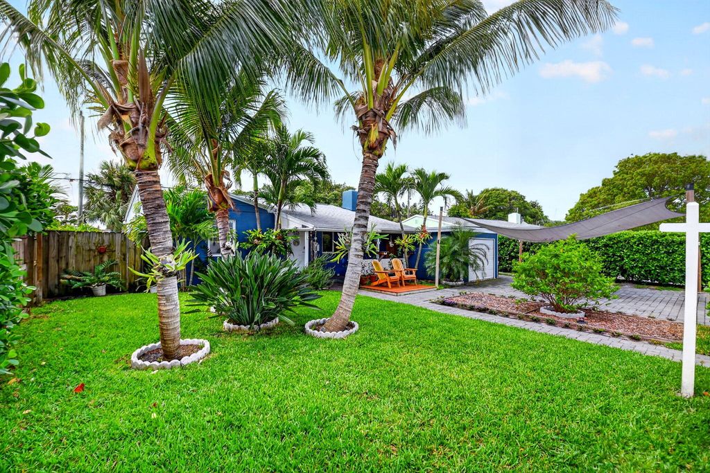 Photo of 1010 Churchill Circle S, West Palm Beach, FL 33405 (MLS # B26015845)