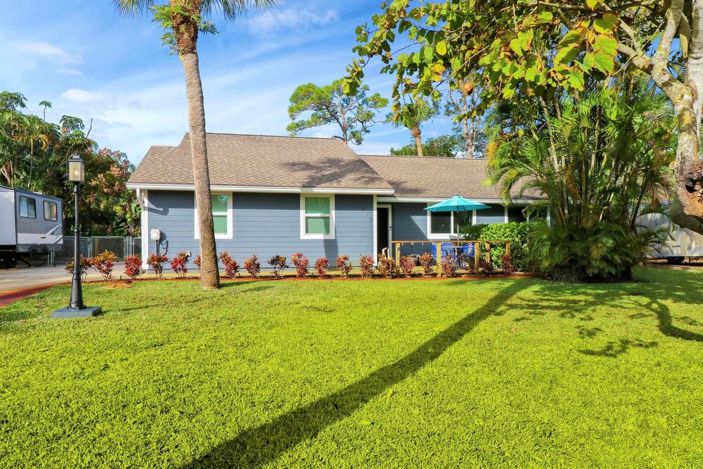 Photo of 972 SW Pine Tree Lane, Palm City, FL 34990 (MLS # R10937930)