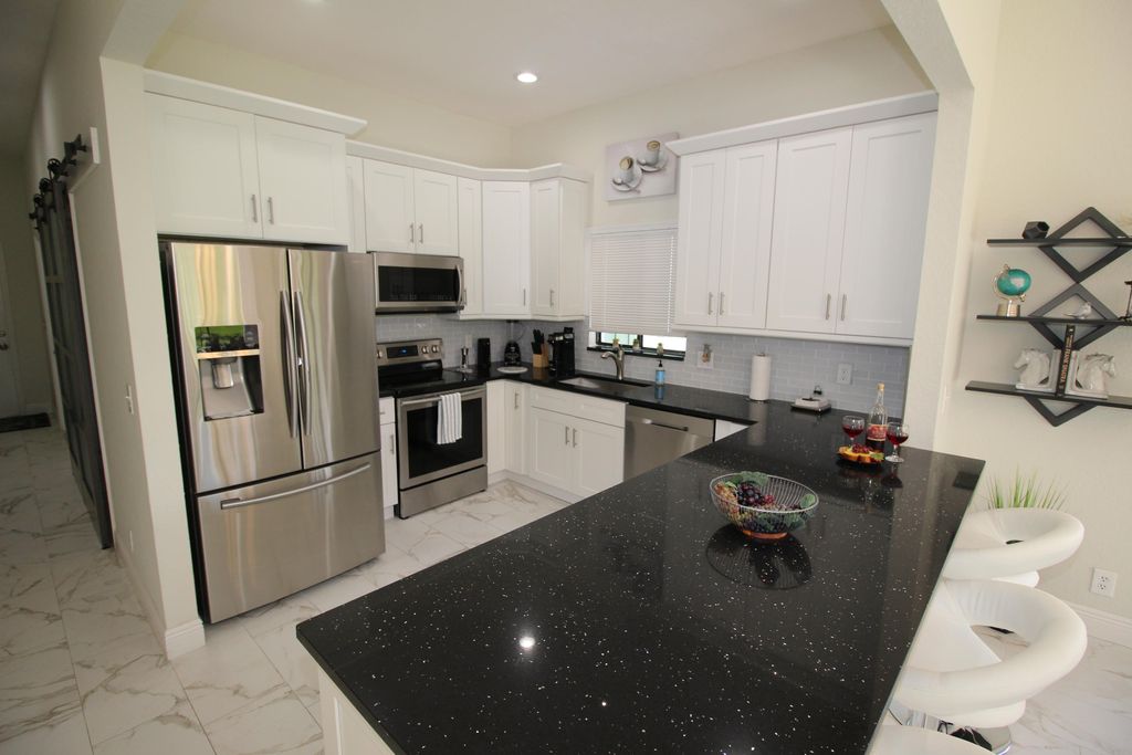 Photo of 1120 Staghorn Street, Wellington, FL 33414 (MLS # R10991351)