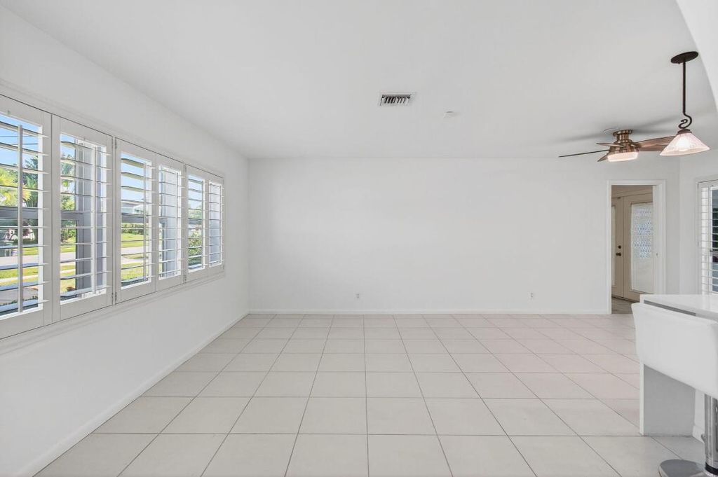 Photo of 699 NW 16th Avenue, Boca Raton, FL 33486 (MLS # R11141945)